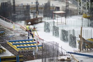 Fresh concrete being poured at a construction site